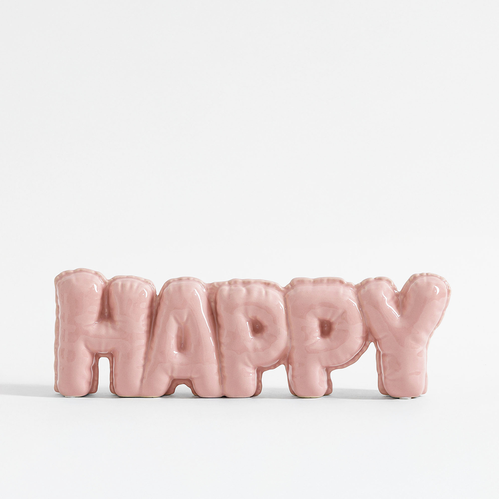 Růžová dekorace s nápisem HAPPY