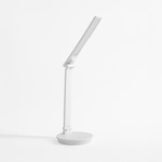 Bílá stolní LED lampa s kulatou základnou