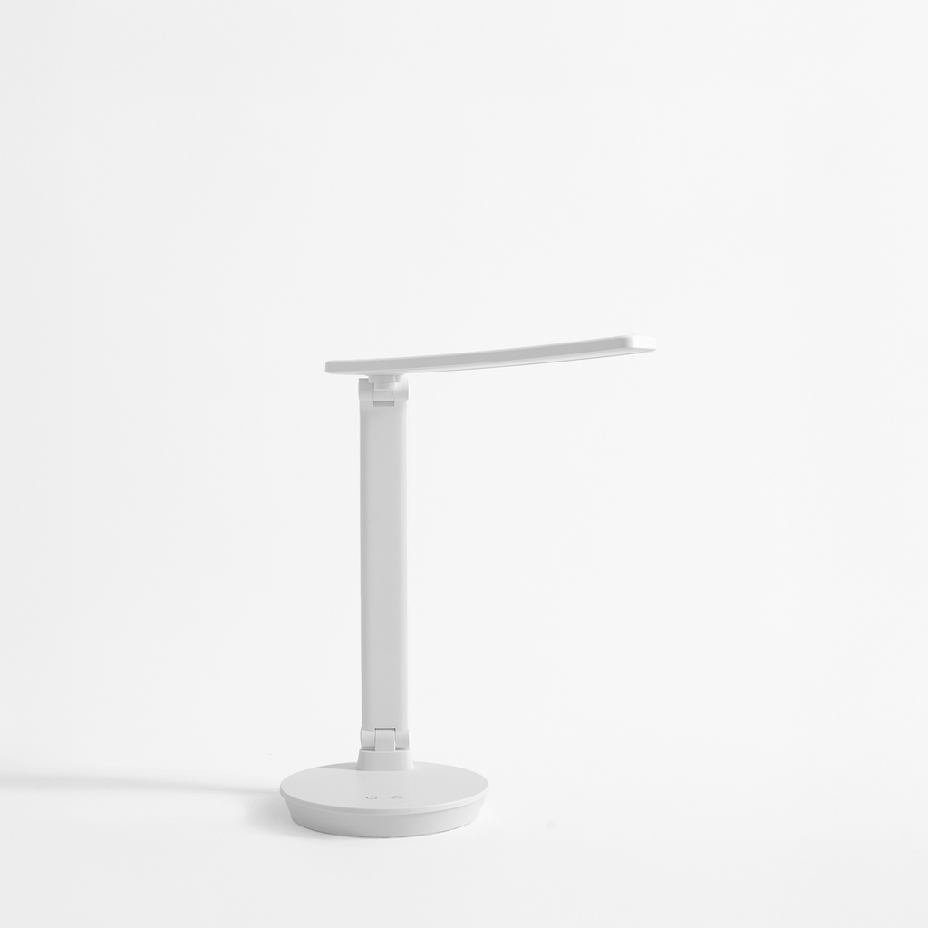Bílá stolní LED lampa s kulatou základnou