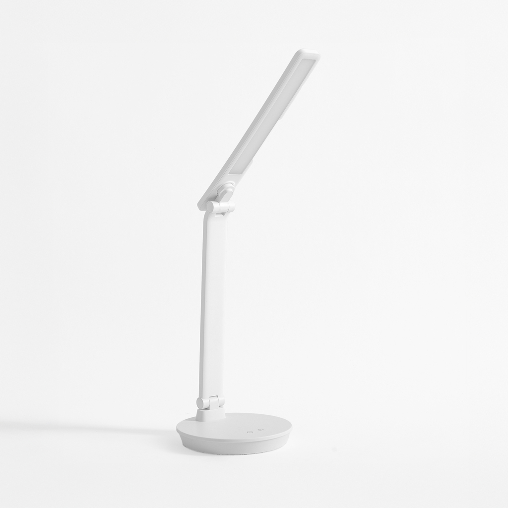 Bílá stolní LED lampa s kulatou základnou
