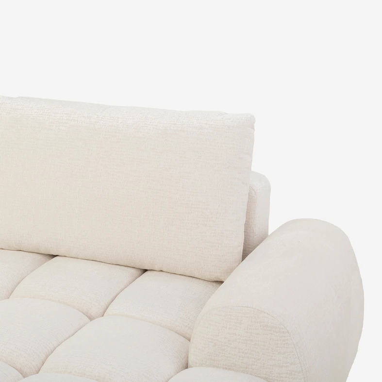 Zdjęcie narożnika. Zbliżenie na detale. Widać fakturę materiału.