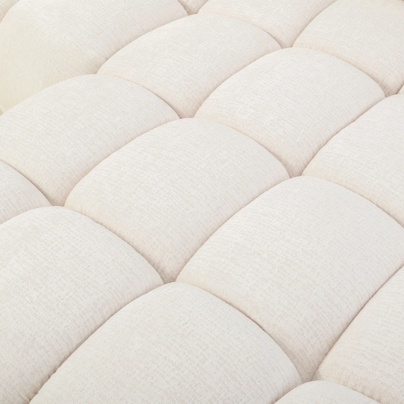 Zdjęcie narożnika. Zbliżenie na detale. Widać fakturę materiału.