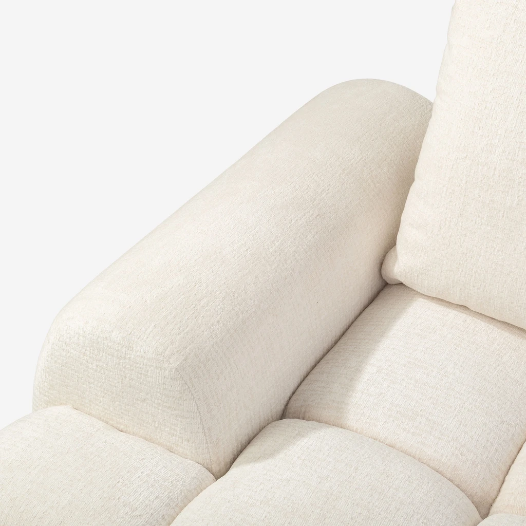 Zdjęcie narożnika. Zbliżenie na detale. Widać fakturę materiału.