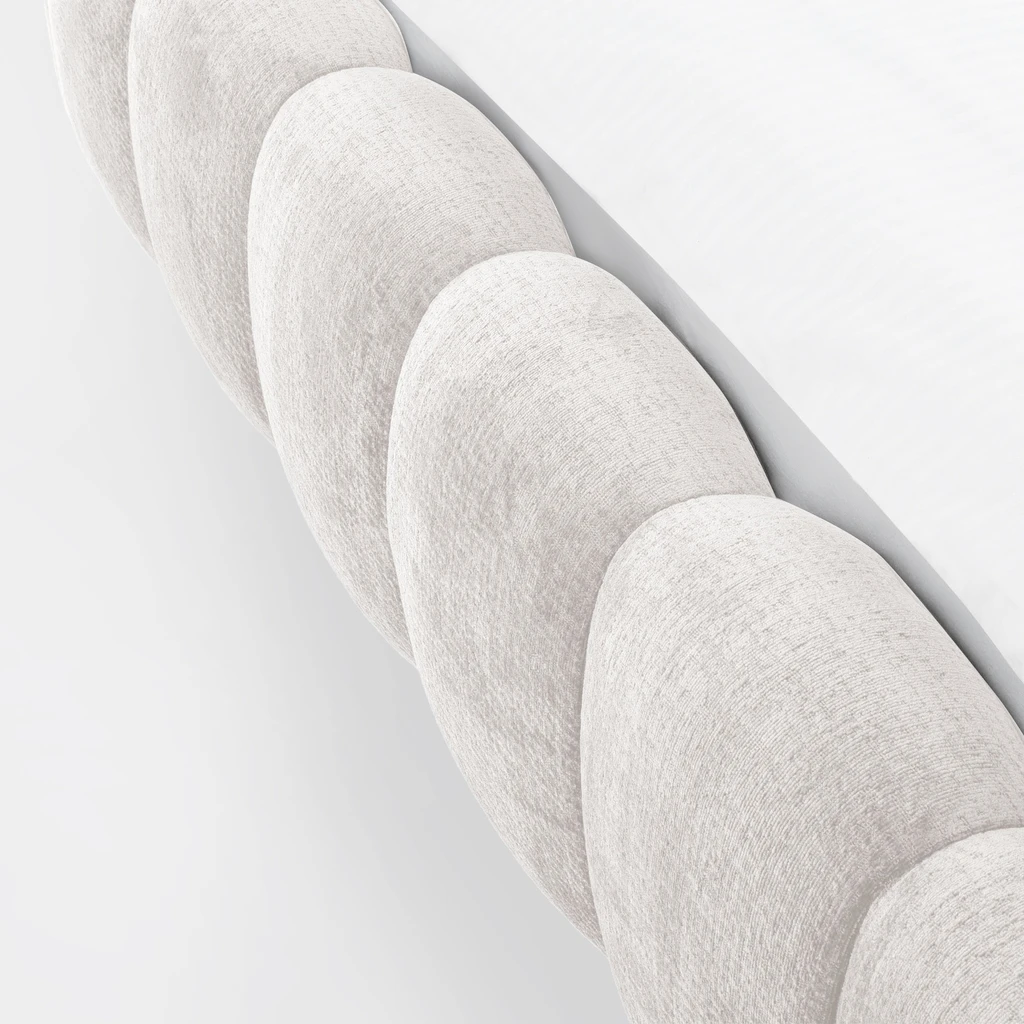 Tkanina TRESOR 22 ma subtelny melanż kremu i bieli, który zmienia się wraz ze światłem.