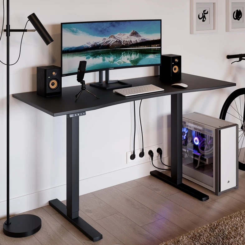 Czarny, gładki blat ułatwia utrzymanie porządku i dobrze komponuje się w domowym biurze.