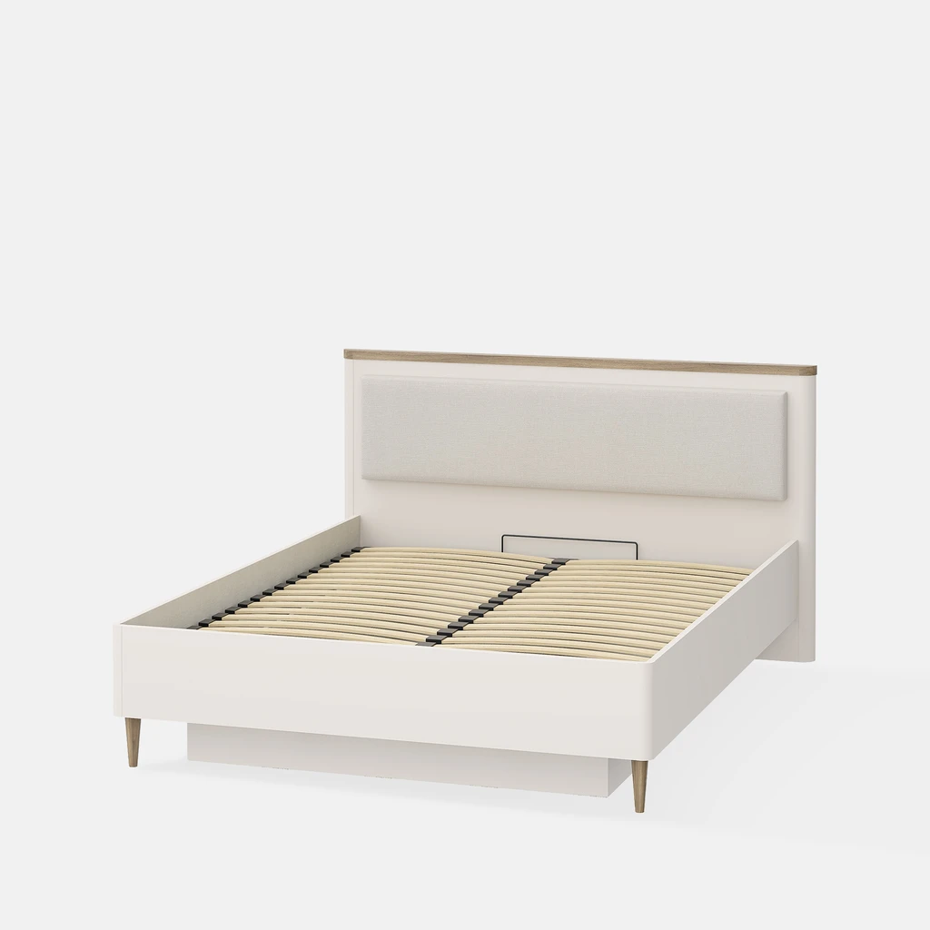 Beżowe łóżko w widocznym stelażem położonym w ramie