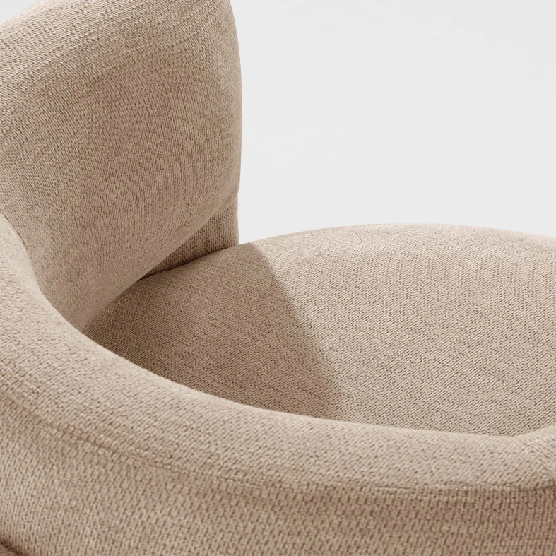 Zdjęcie fotela. Zbliżenie na detale. Widać fakturę materiału.