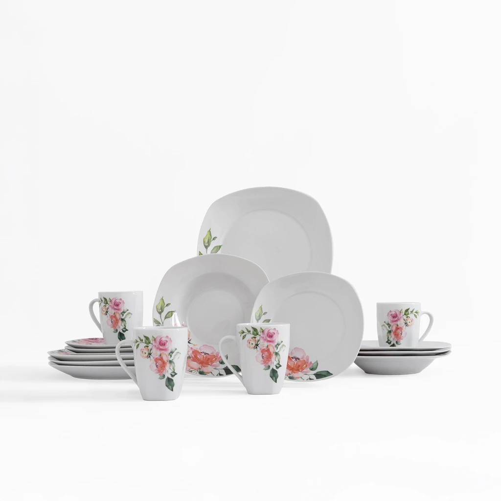 Zestaw obiadowy z delikatnym kwiatowym wzorem na białej porcelanie. Widoczne talerze obiadowe, głębokie i deserowe oraz kubki.