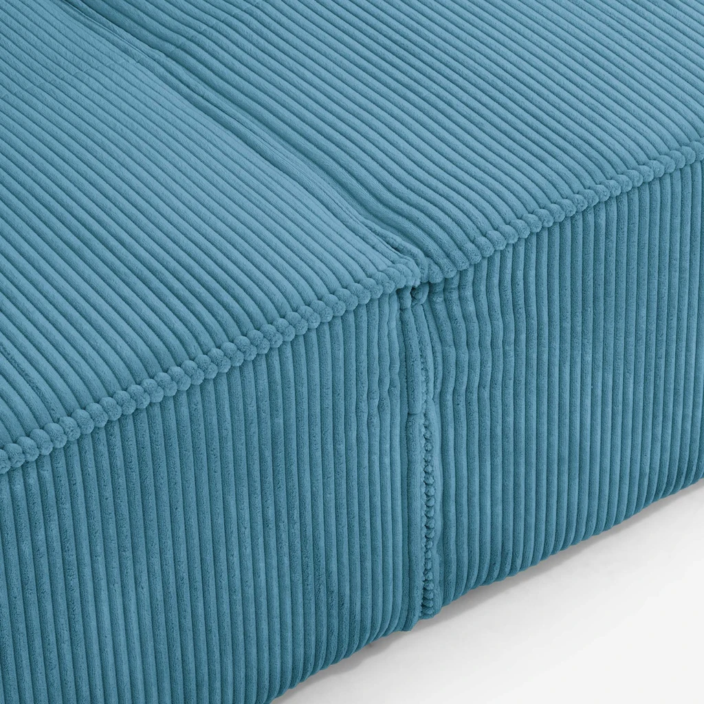 Ciepły turkus i miękkie siedzisko LUSO sprawiają, że odpoczynek staje się przyjemnością.