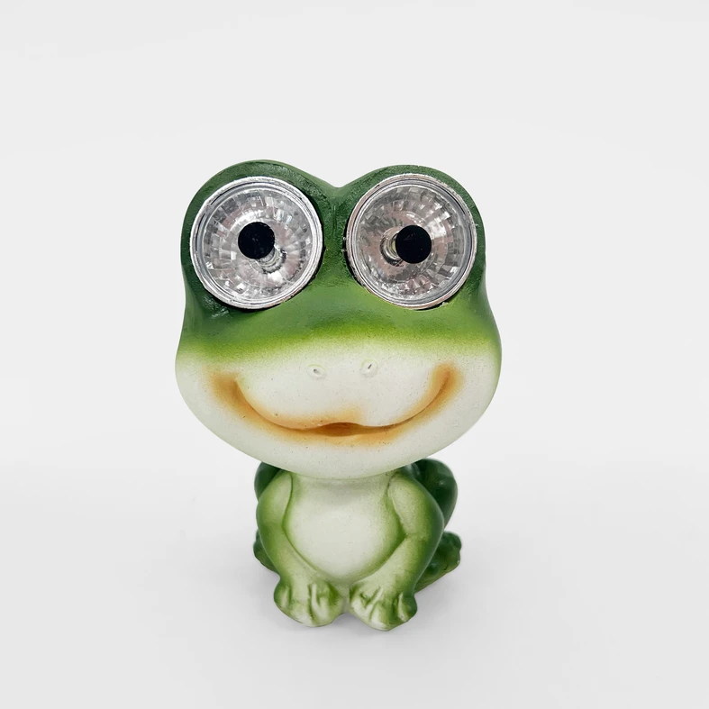 Dominującym kolorem figurki ŻABY są oczywiście odcienie zieleni.