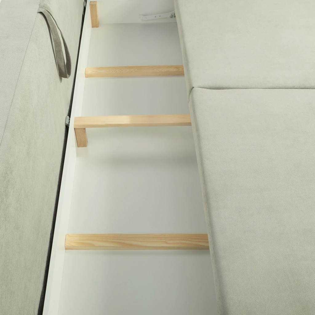 Zdjęcie sofy. Zbliżenie na pojemnik na pościel.