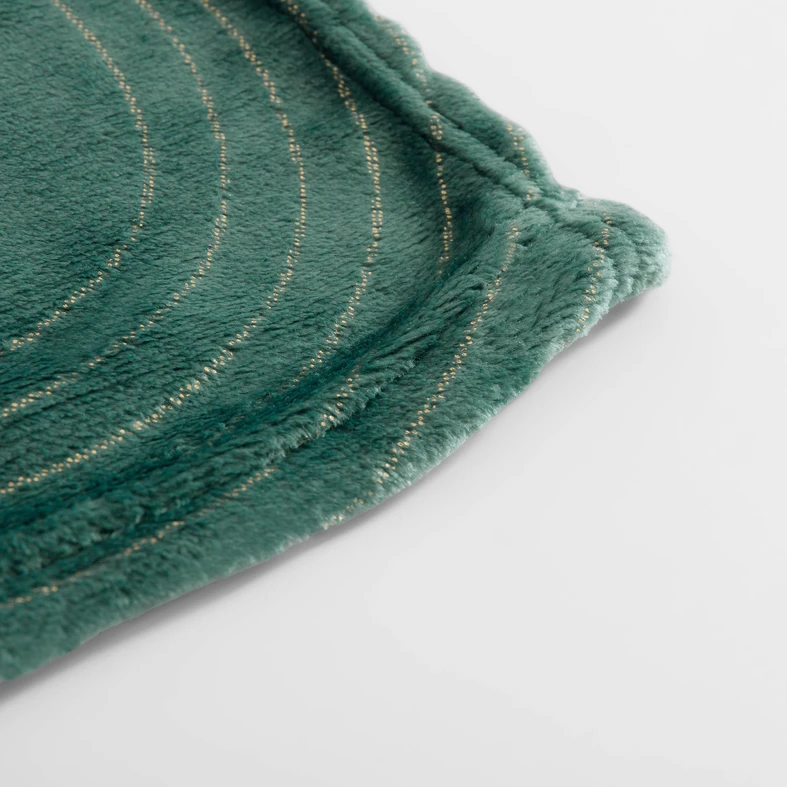 Ciemnozielony koc z geometrycznym wzorem