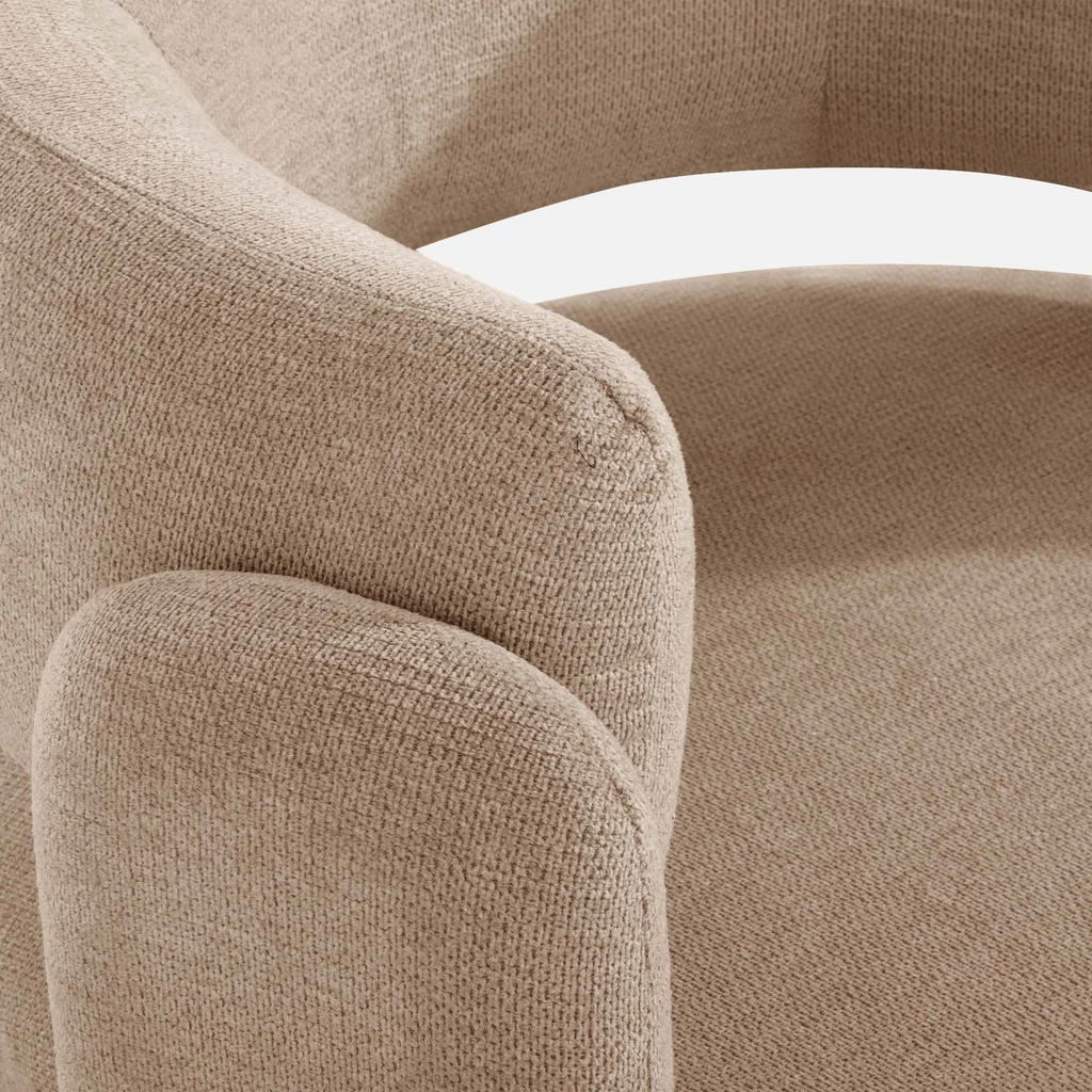 Zdjęcie fotela. Zbliżenie na detale. Widać fakturę materiału.