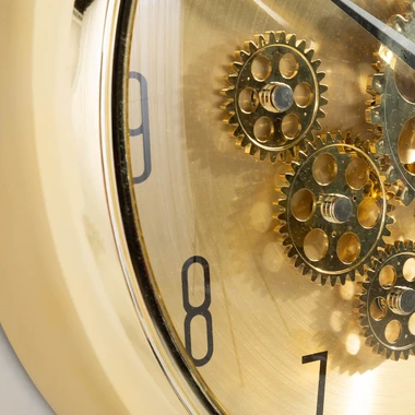 Zlaté nástěnné hodiny s pohyblivými kolečky 35 cm