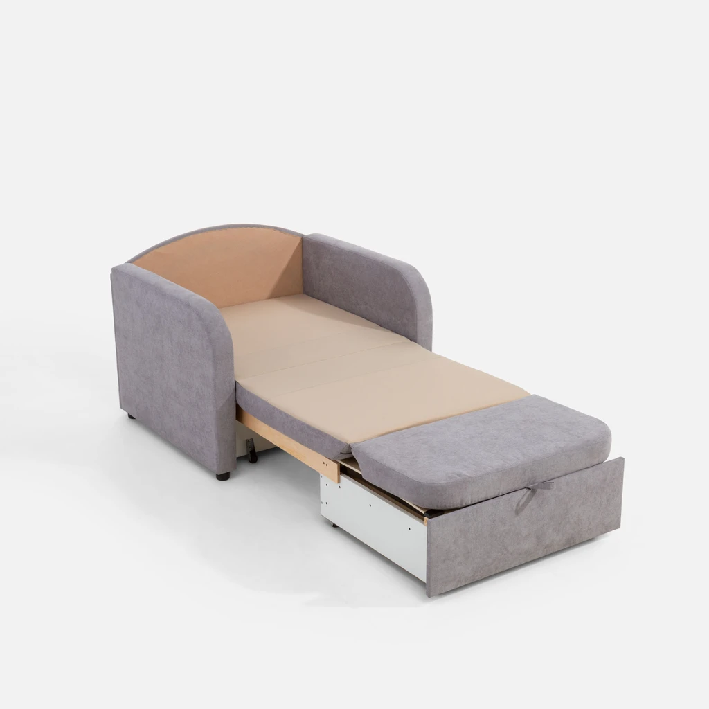 Jednoosobowa sofa po rozłożeniu. Oparcie ułożone na stelażu pojemnika na pościel. 