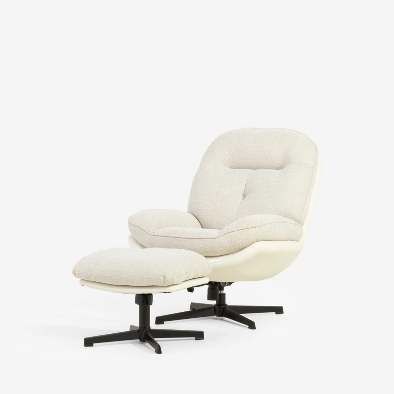 Zdjęcie ogólne fotela z podnóżkiem. Meble widoczne pod lekkim kątem. 