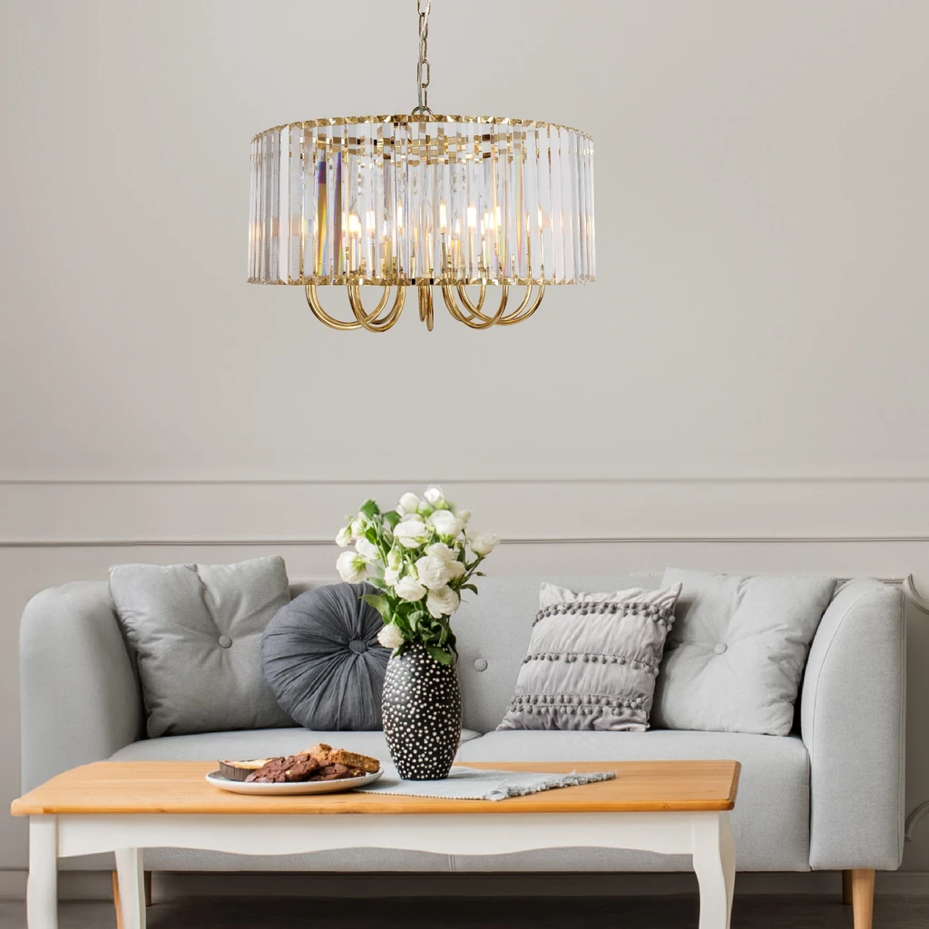 PARIS to lampa wisząca o złotym wykończeniu do salonu glamour. Posiada oprawę dla 10 żarówek typu E14 i mocy maksymalnej 40W.