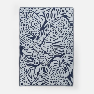 Tmavě modrý koberec s listy SUNSET 120x180 cm