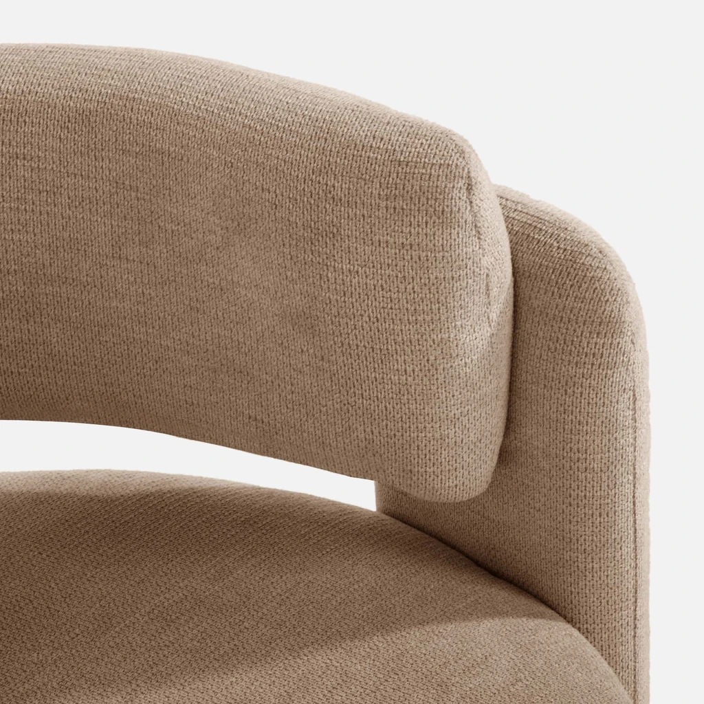 Zdjęcie fotela. Zbliżenie na detale. Widać fakturę materiału.