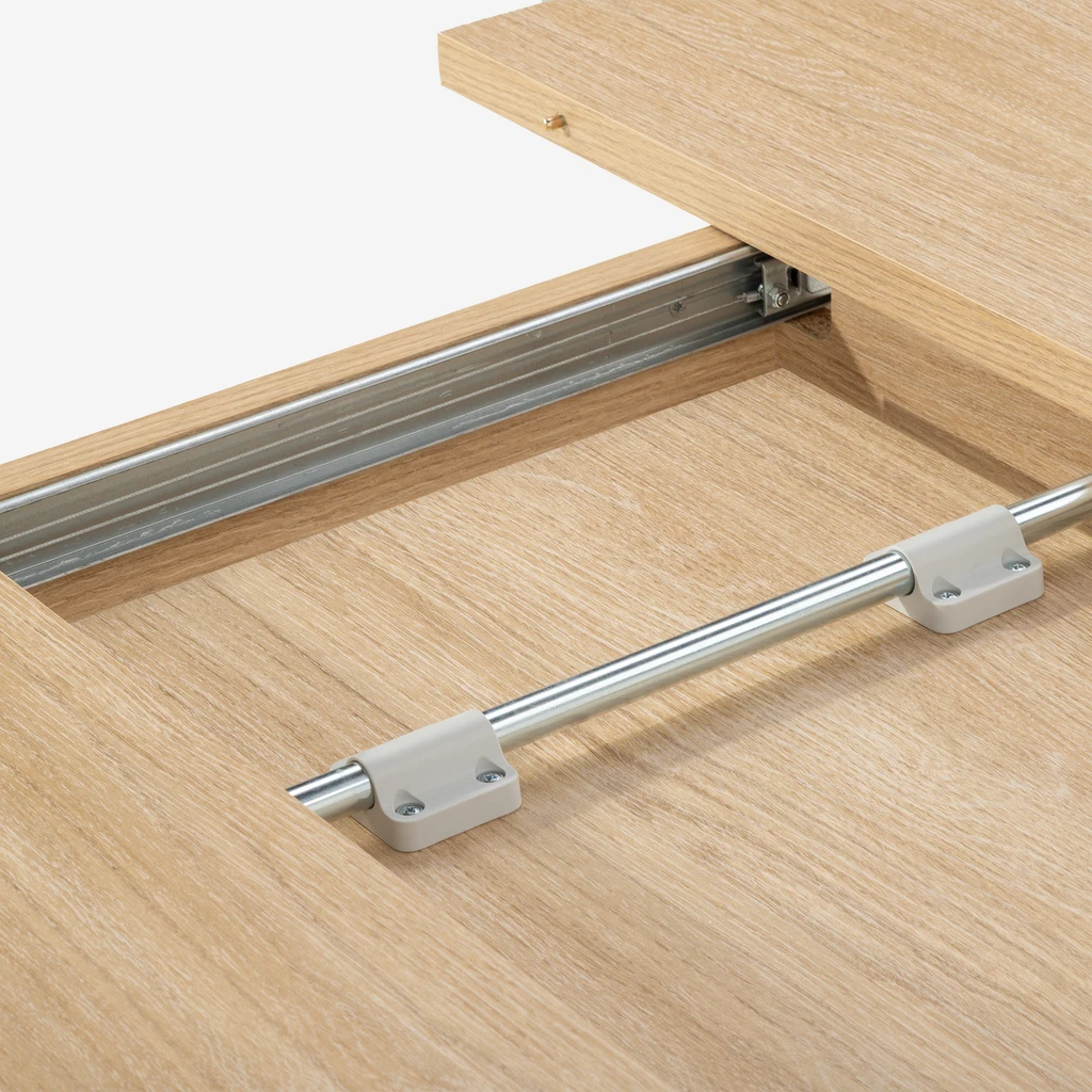 Zdjęcie stołu. Zbliżenie. Widać system rozkładania.