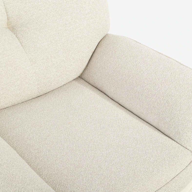 Zdjęcie fotela. Zbliżenie na detale. Widać fakturę materiału. 