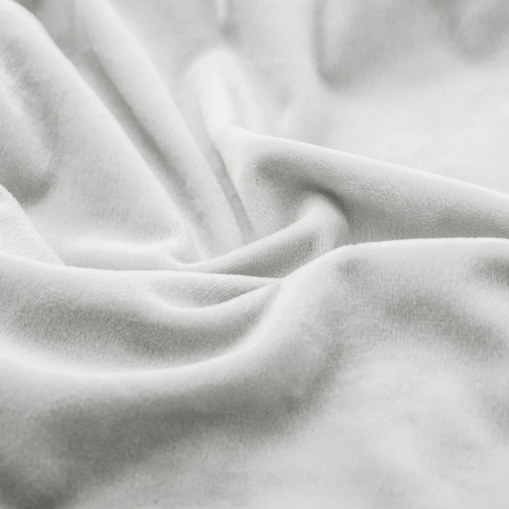 Zdjęcie pokrowca. Duże zbliżenie. Widać marszczenia i fakturę materiału.