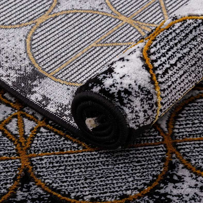 Koberec se zlatým kruhovým vzorem GRANDE 80 x 150 cm