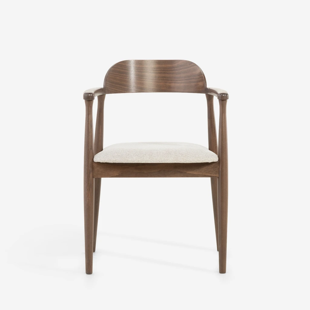 Beżowe krzesło PERUGIO umila codzienne posiłki dzięki miękkiemu siedzisku i lekkiej formie.