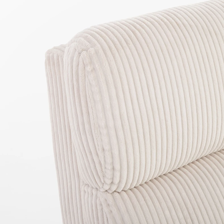 Zdjęcie fotela. Zbliżenie na detale. Widać fakturę materiału.