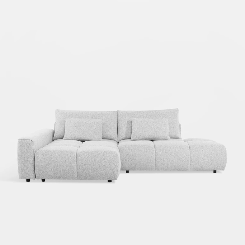 Narożnik BIANCO O w biało-szarych odcieniach z subtelnym melanżem tkaniny wprowadza spokój do salonu.