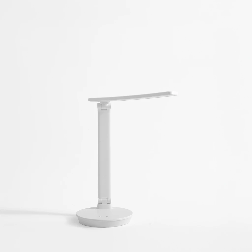 Bílá stolní LED lampa s kulatou základnou