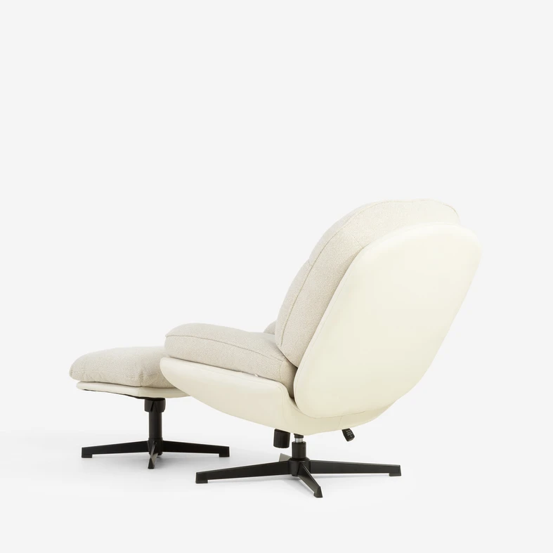 Zdjęcie ogólne fotela z podnóżkiem. Meble widoczne pod lekkim kątem. 