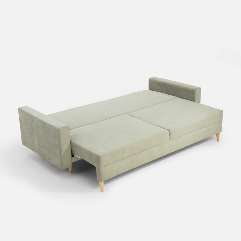 Zdjęcie sofy. Widać narożnik po rozłożeniu.