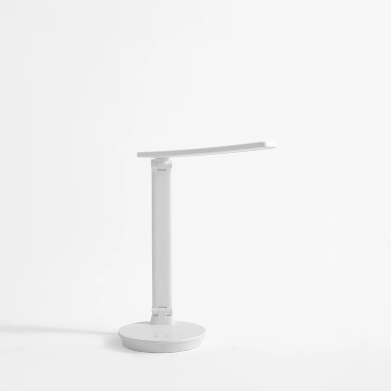 Bílá stolní LED lampa s kulatou základnou