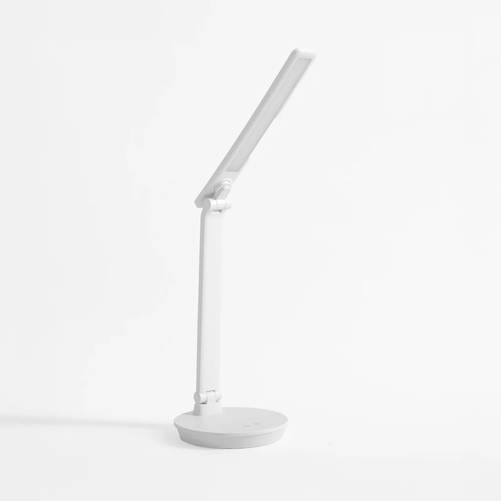 Bílá stolní LED lampa s kulatou základnou