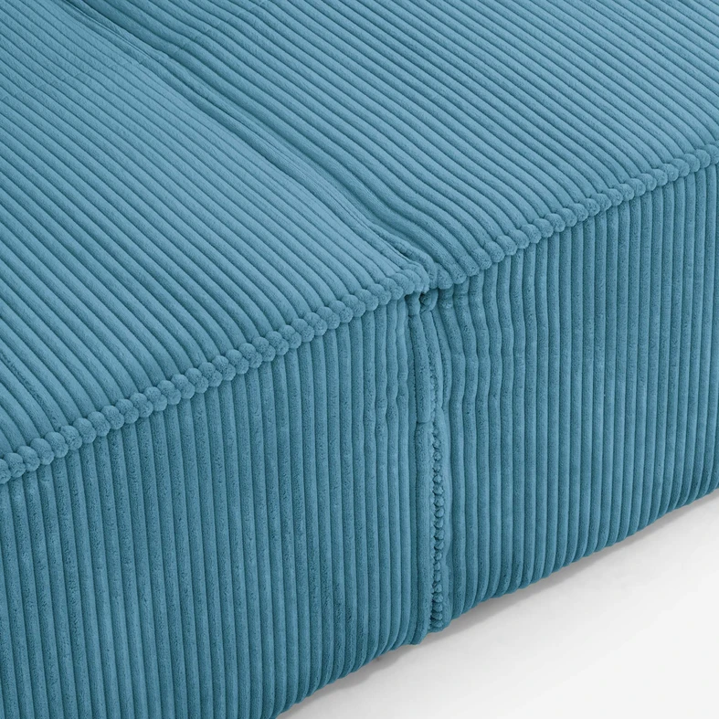 Ciepły turkus i miękkie siedzisko LUSO sprawiają, że odpoczynek staje się przyjemnością.