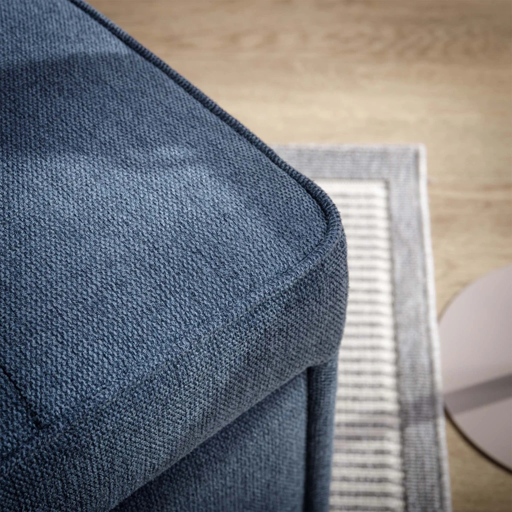 Niebieska sofa 1-osobowa rozkładana, z kieszenią boczną